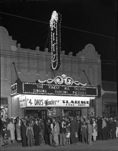 People gather outside of the Ritz theater People gather outside of the Ritz theater
